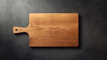 Wooden cutting board on black background