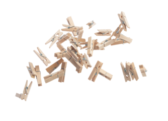 Wooden clothespins float gracefully in air, purposeful clips and holds transformed into a dance of household order and creative inspiration. Beige bundle of laundry dangles. White background isolated