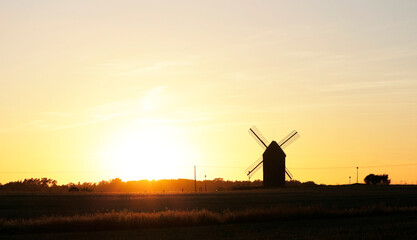 windmill silhouette and sunset, beautiful landscape