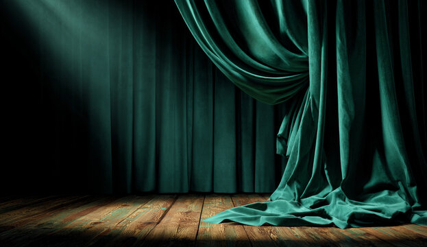 Elegant emerald green velvet curtain draped on a wooden stage with rich texture and flowing style, illuminated by soft stage lighting