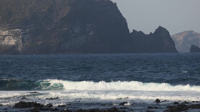Jeju-do, Seongsan Ilchulbong  landscape, volcanic tuff cone, Sunrise peak, Jeju Island, South Korea, Seongsan-ri, Seogwipo, Jeju Province landscape view in a sunny day, with sea, cliffs hiking trail