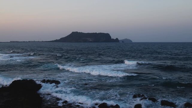 Jeju-do, Seongsan Ilchulbong  landscape, volcanic tuff cone, Sunrise peak, Jeju Island, South Korea, Seongsan-ri, Seogwipo, Jeju Province landscape view in a sunny day, with sea, cliffs hiking trail
