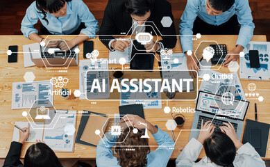 A diverse group of professionals engage in a collaborative meeting using modern technology and AI assistants to enhance productivity and innovation in a corporate workspace. Amity