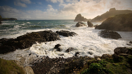 Kynance Cove, Lizard, Cornwall, England. Waves crashing on the beach