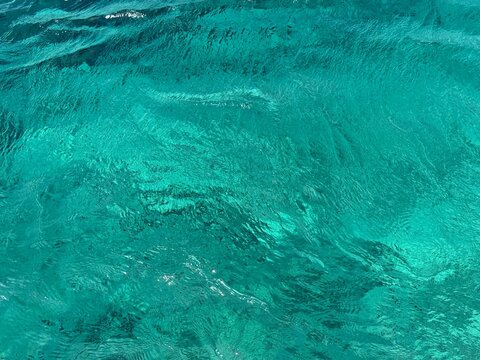Turquoise sea water natural background.