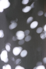 texture background of cracked white wax paper with atmospheric lights and shadows