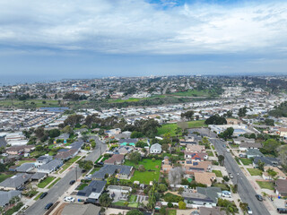 Fototapeta premium Aerial view of houses in the valley of Oceanside town in San Diego, California. USA.