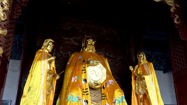 Fuxi's statue in golden form, located in Tongtain Hall, Taihao Mausoleum Temple, in Zhoukou City, Henan Province, China. 
