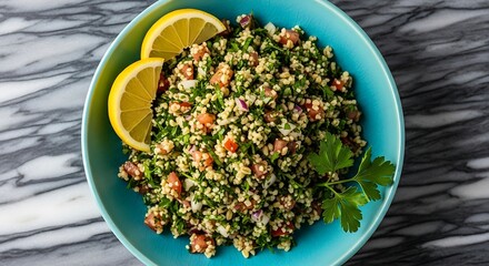 Tabbouleh Salad with Lemon Slices in Turquoise Bowl