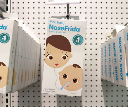 NoseFrida Baby Nasal Aspirator Package On Retail Pegboard