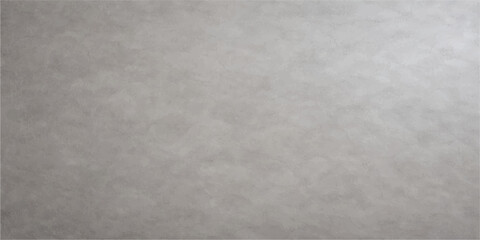 Fototapeta premium A textured gray concrete wall background with a rough grunge surface and blank canvas pattern creates a vintage light grey backdrop for modern design