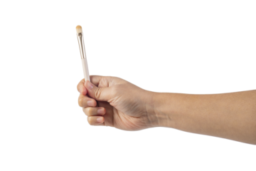 Pink cosmetic blush in hand on transparent background