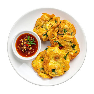 Crispy kerak telor mini omelet, a popular indonesian street food known for its rich and savory taste, isolated on a plain white background