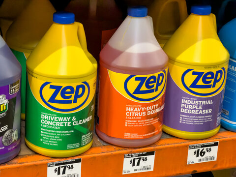Zep Industrial Degreaser And Concrete Cleaner Bottles On Hardware Store Shelf