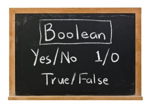 Boolean yes no one zero true false concept handwritten in white chalk on a black chalkboard in a wooden frame isolated on white