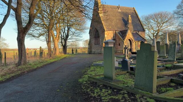 Church in a graveyard memorial site headstones gravestones death tombs