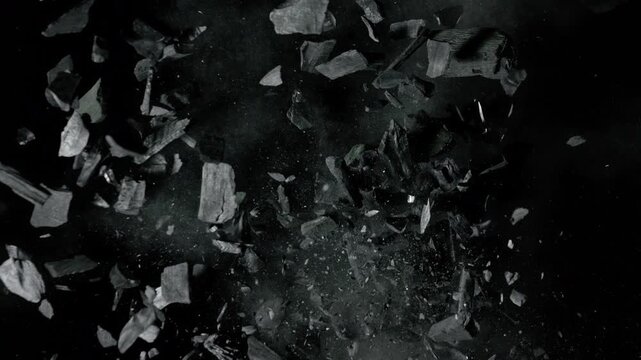 Super Slow Motion of Black Charcoal Colliding in Mid-Air at 1000 fps.