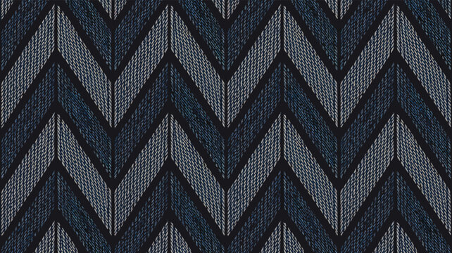 Blue and grey herringbone knit texture with chevron geometric fabric weave pattern background