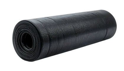 A tightly rolled, textured black cylinder, partially unrolled, set against a dark backdrop