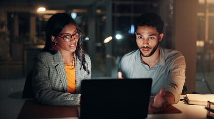 Laptop, conversation and business people in office at night with creative project in collaboration....