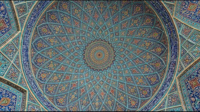Intricate Islamic Geometric Patterns Adorning a Majestic Mosque Dome with Stunning Blue and Gold Tilework