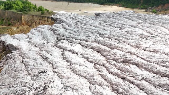 Angola most famous natural landmark from above, aerial perspective of Miradouro da Lua, showcasing the iconic eroded rock formations and deep orange earth tones