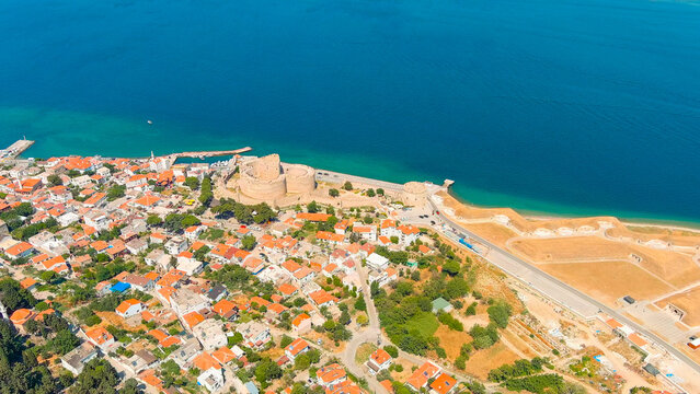 Canakkale, Turkey. Panoramic aerial view of the city on the Asian shore of the Dardanelles Strait, a vibrant Turkish port with ferry terminals and waterfront promenade on a sunny day. Aerial view