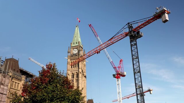Parliament building under restoration in Ottawa, Canada. Scaffolding and cranes working in downtown