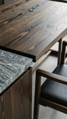A sophisticated close-up of a modern furniture joint, showcasing the beautiful contrast between rich, dark wood grain and a cool, veined marble surface.
