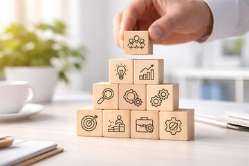 Business Growth Strategy Concept with Wooden Blocks, Teamwork, Innovation, Analytics and Goal Achievement Icons in a Modern Office Setting.