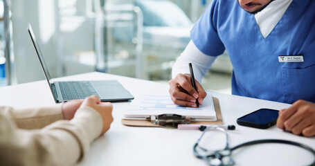 Hands, patient and doctor writing in consultation for medical history, health report and diagnosis. Healthcare, people and male professional with clipboard for insurance info and checklist in clinic
