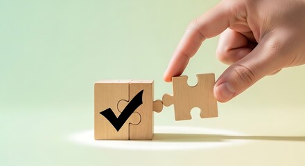 A hand places the last puzzle piece onto a wooden cube with a checkmark, signifying the successful completion of a task or project.