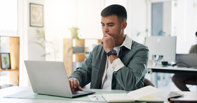 Businessman, laptop or thinking with documents for business idea, planning or strategy in office. Thoughtful, man or employee with computer for schedule, brainstorming or decision making in workplace