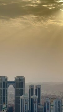 A cinematic view of the Jabal Omar towers featuring the world's highest prayer room bridge in Makkah, Saudi Arabia. ideal for travel agencies promoting Hajj and Umrah packages, Islamic documentary 