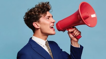 Young businessman shouting through megaphone expressing announcement promotion leadership influence marketing communication and bold corporate messaging - Powered by Adobe