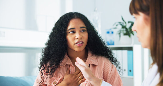 Consultation, chest pain and doctor with woman in clinic for healthcare discussion with advice. Diagnosis, checkup and female patient with medical worker for asthma treatment in hospital office.