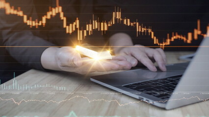 Business investor holding a gold bar with stock market chart overlay, symbolizing financial security, safe haven asset, wealth management, trading strategy, inflation hedge,  uncertainty concept.