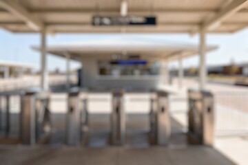 Fototapeta premium Blurry image of the turnstile, access to the ticket gate to enter the tourist attraction 