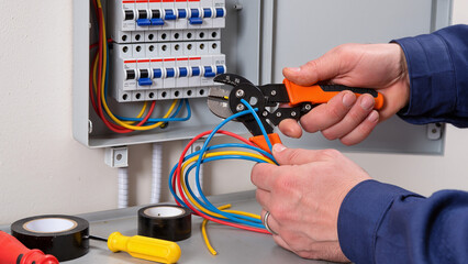 electrician fixing electrical wires