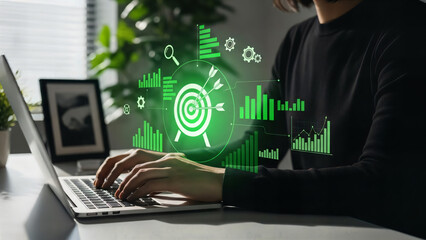 businessman analyzing data on laptop with graphs and charts on screen
