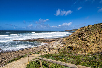 Matadouro beach in Ericeira, Portugal with beautiful touristic resorts, sandy beach and best surf conditions