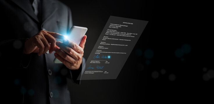 Electronic signing of online job application via mobile device, concept of digital recruitment, paperless HR workflow, and futuristic business technology for secure data submission.