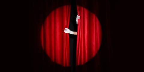 Female hands in white gloves opening red curtains on dark background