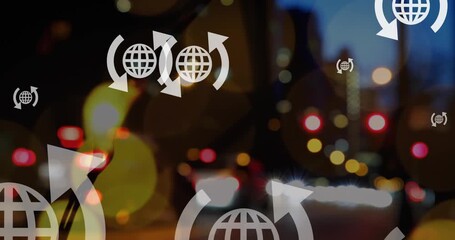 Animation of globe and arrows icons over out of focus city lights - Powered by Adobe