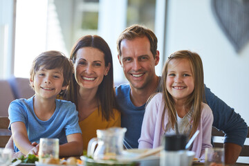 Obraz premium Happy, lunch and portrait with family in dining room of home for love, bonding and health together. Nutrition, support and food with people eating at table in apartment for feast, weekend and meal