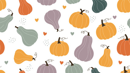 Beautiful seamless pattern of colorful autumn pumpkins and squash mixed with small hearts and decorative dots on white.