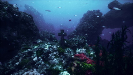 Obraz premium Vibrant coral reefs surround a mysterious cross submerged in deep blue water. Schools of colorful fish swim through the scene, creating a captivating underwater landscape.