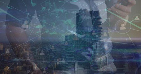 Animation of network of profile icons over mid section of a man using smartphone against cityscape - Powered by Adobe