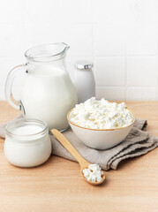Fresh cottage cheese, milk, and yogurt creating a healthy breakfast
