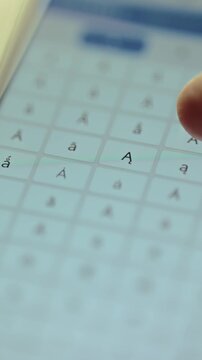 Smartphone keyboard with a variations of the letter A with diacritical marks